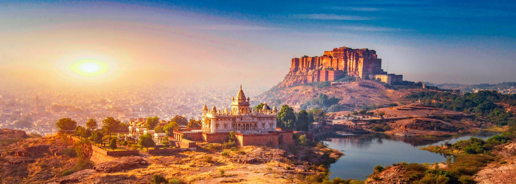 Sunrise at the Mehrangarh Fort and Jaswant Thada Mausoleum with the city in the background.