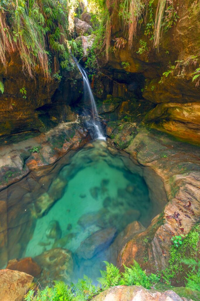 Waterfall and crystal-clear swimming hole at Madagascar’s Isalo National Park.