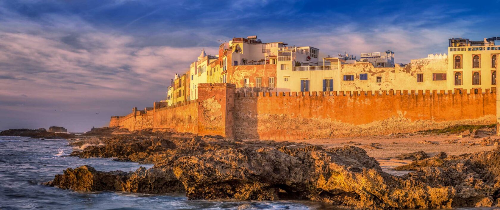 Moroccan seaside town of Essaouira with defensive fort wall.