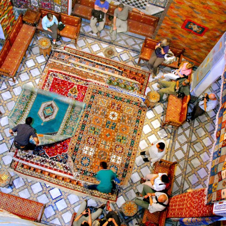 An aerial view of the inside of a rug shop in Morocco.