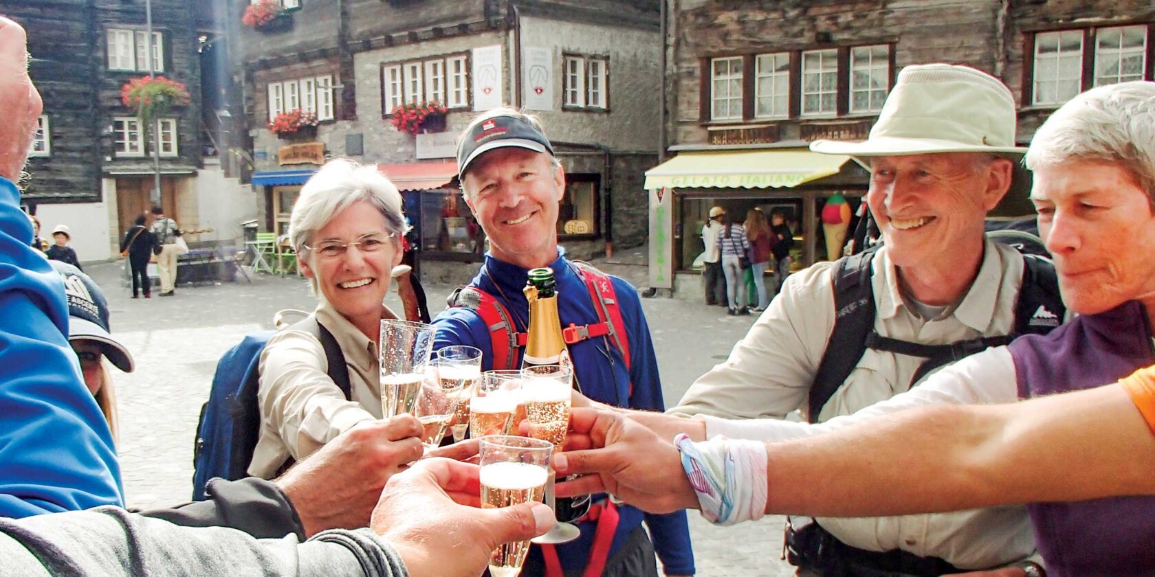 A group of travelers enjoying a glass of champagne.