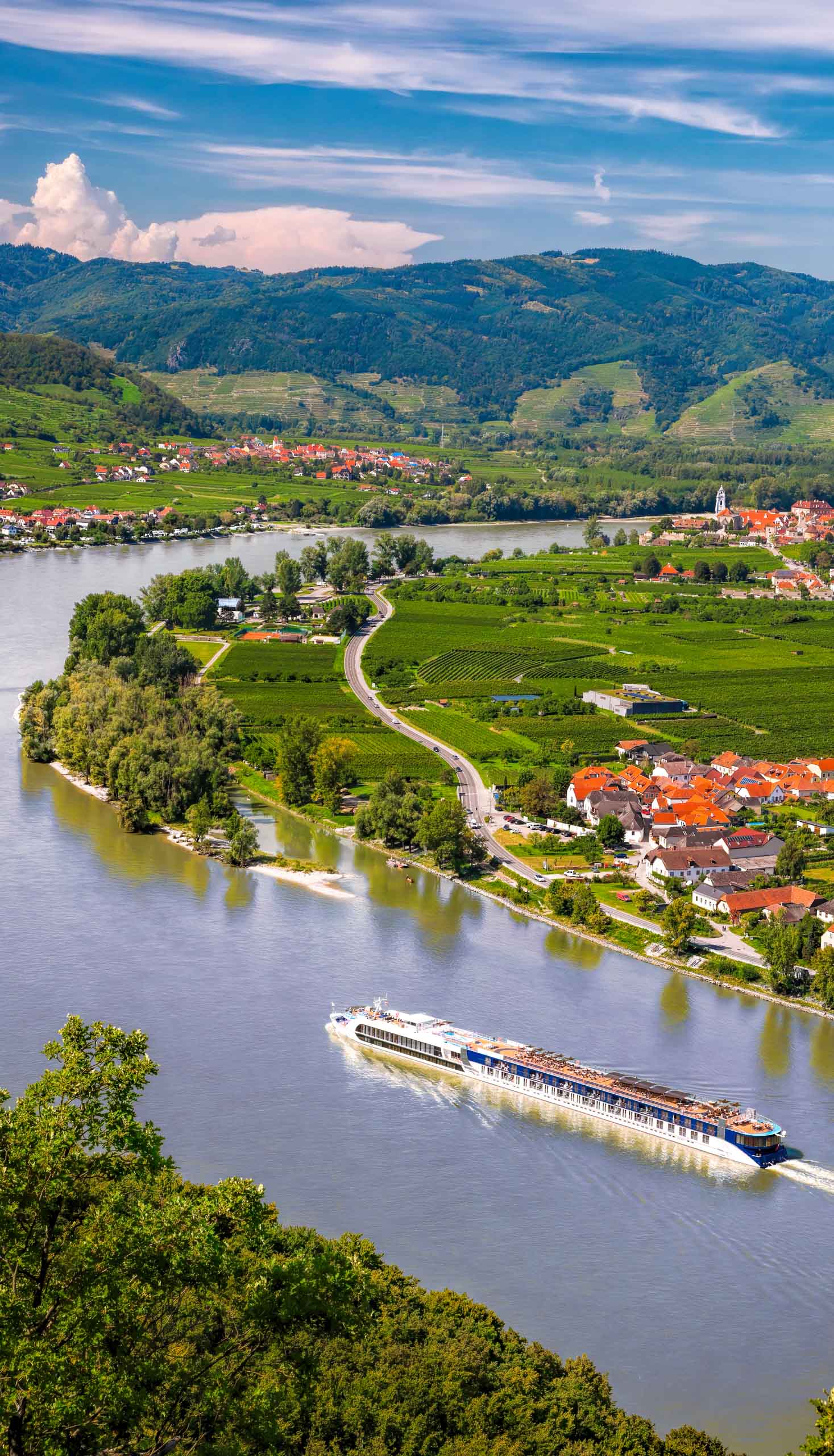 Wachau valley with a ship on Danube river.