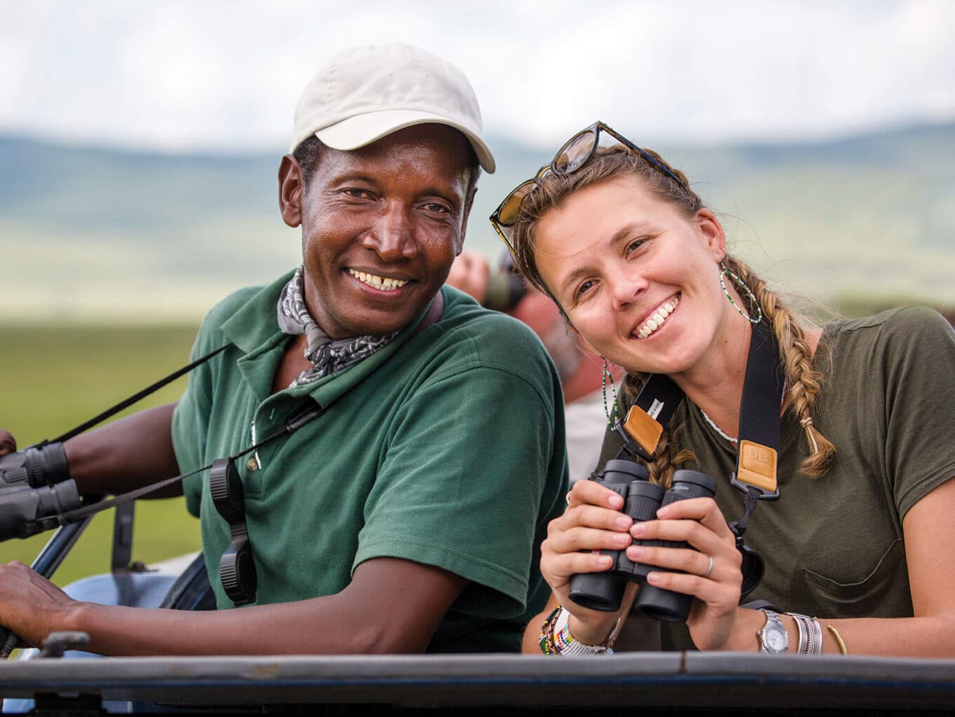 Two safari leaders smiling.