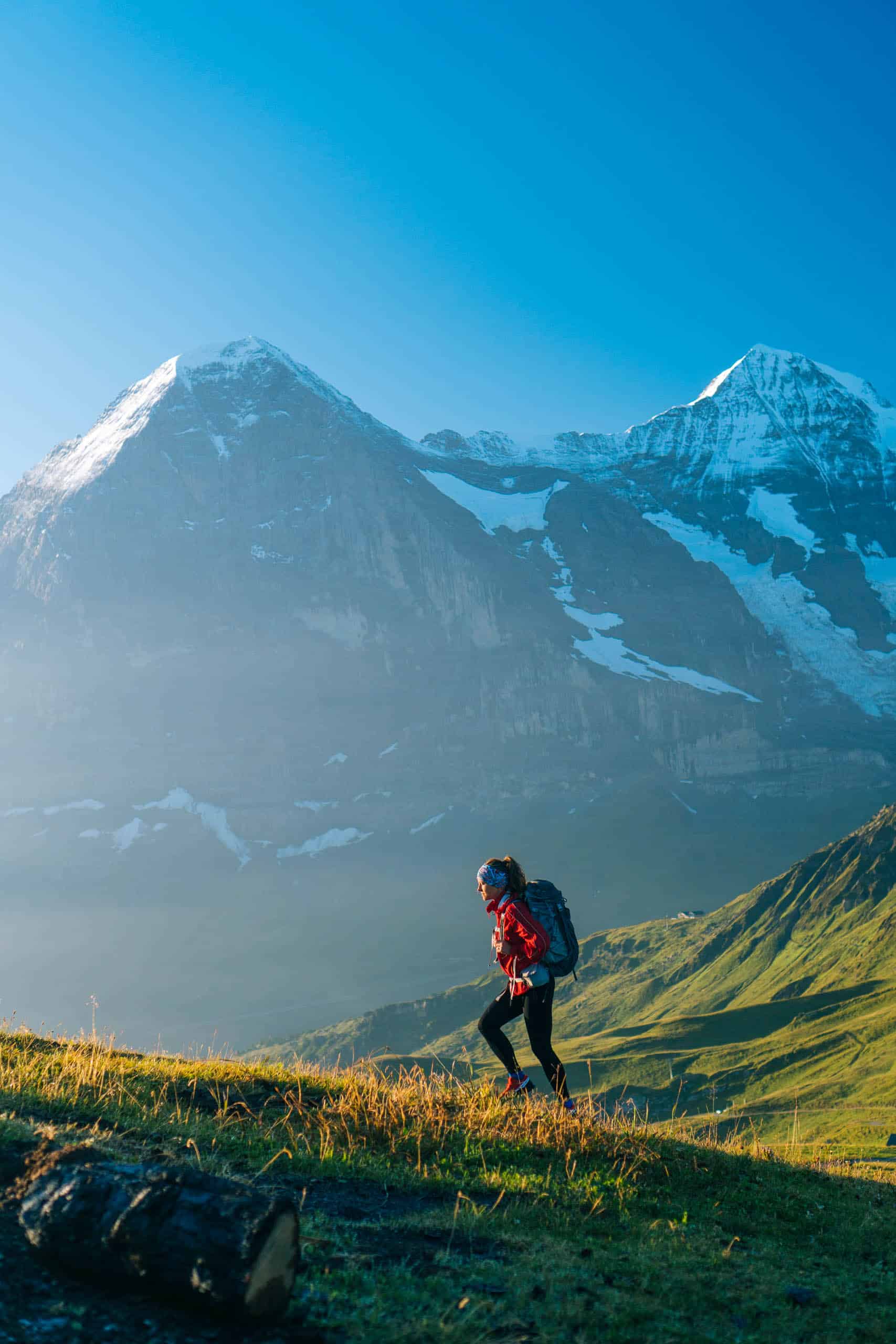 A person hiking mountains in Switzerland.