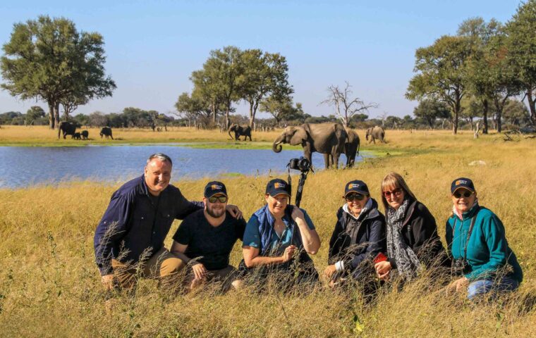 A group of people on a safari in Zimbabwe.