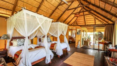 The interior of a safari lodge bedroom in Zimbabwe.