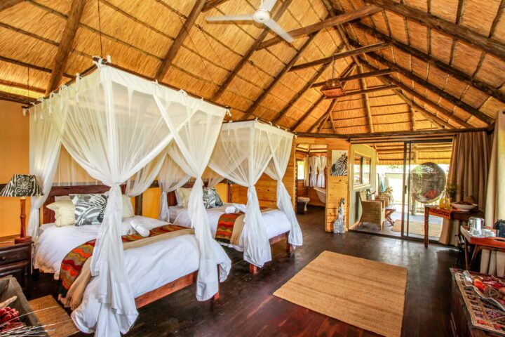 The interior of a safari lodge bedroom in Zimbabwe.