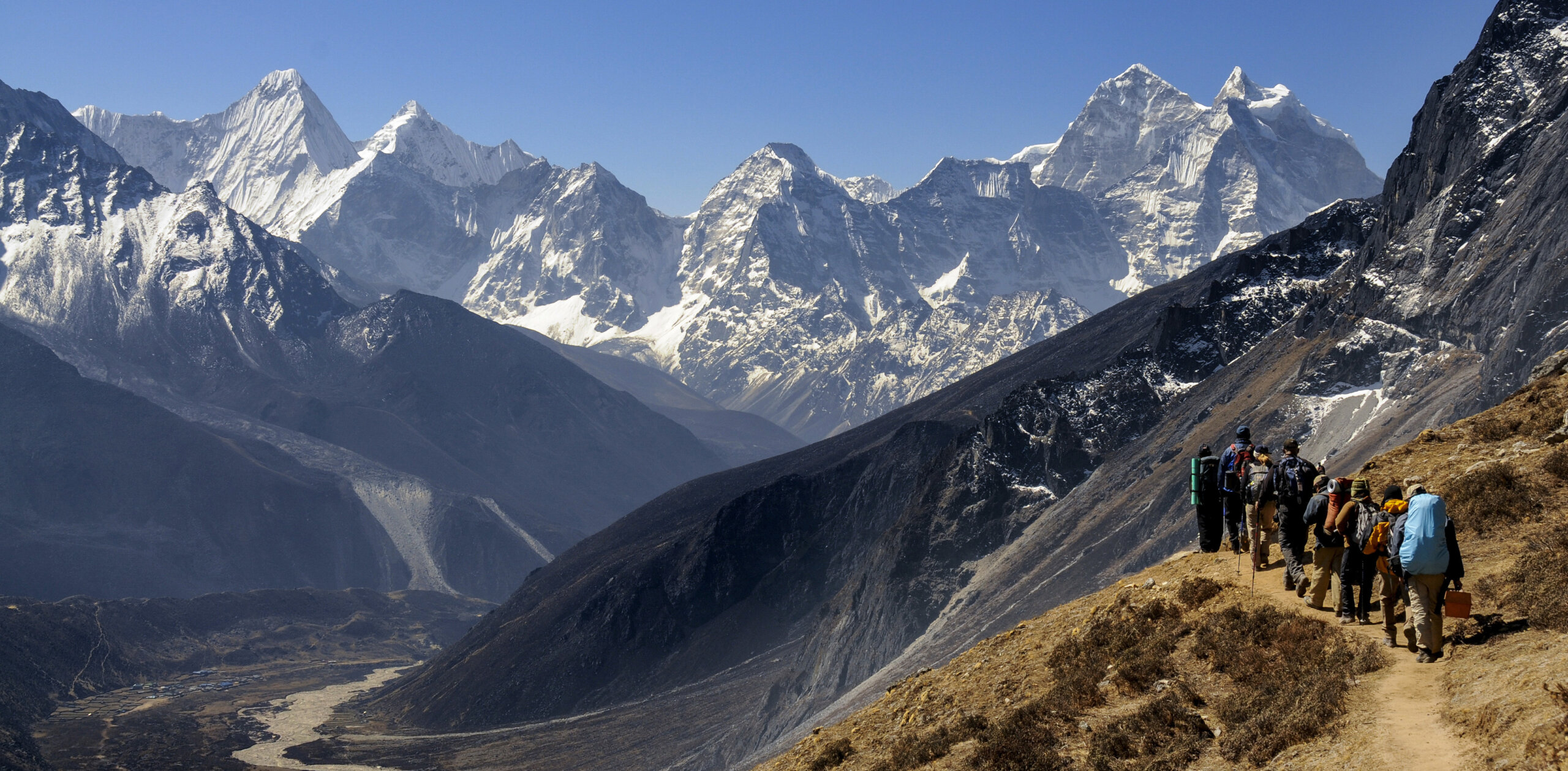 https://www.wildernesstravel.com/wp-content/uploads/2023/06/10-EVSTBASE-everest-himalayas-hiking-tour-scaled.jpg