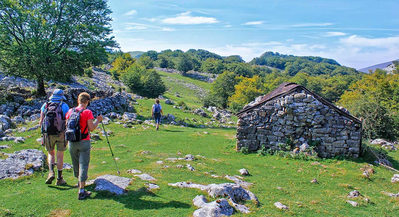 https://www.wildernesstravel.com/wp-content/uploads/2023/06/14-HIKEBASQ-basque-country-hikers-spain.jpg
