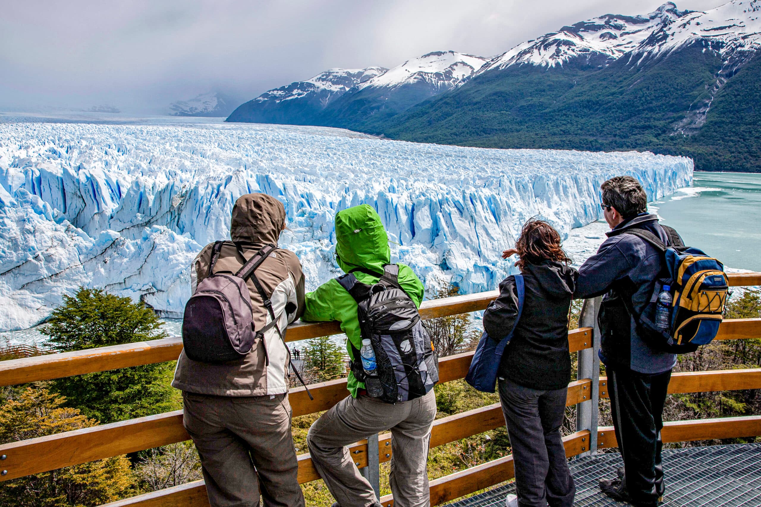 Hikers overlooking perito moreno glacier