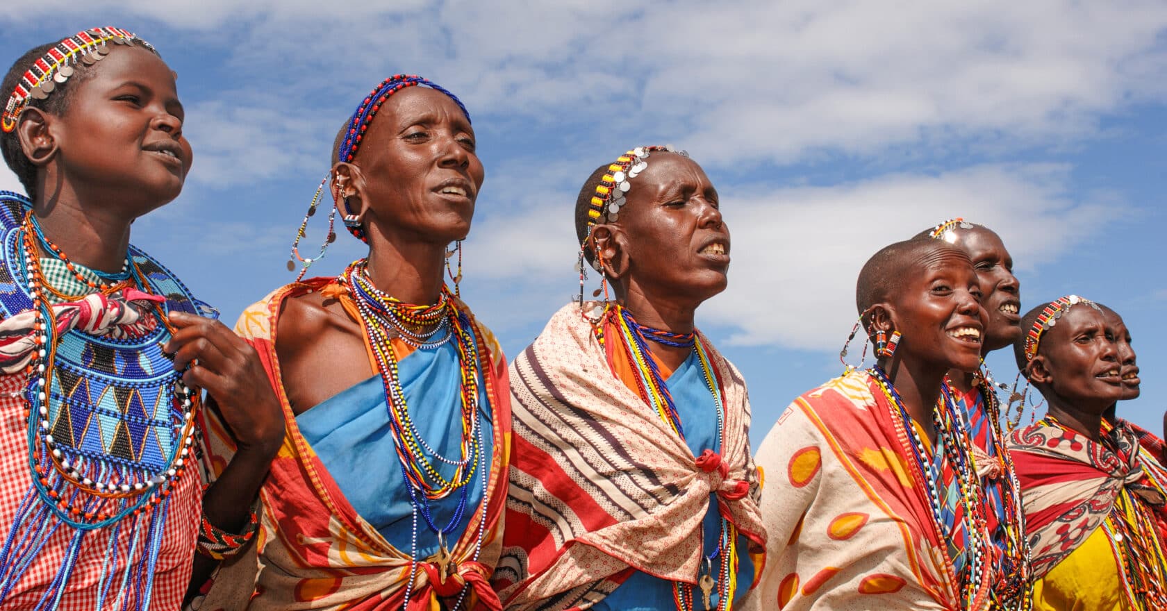 Kenyan tribal women singing and dancing