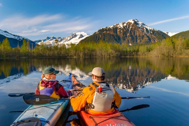 Kayakers at Mendenhall Lake in Alaska.