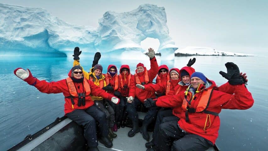 A group of tourists on an expedition in Antarctica.