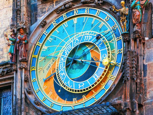 Astronomical clock at the City Hall Tower at the Market Square in the Old Town in Prague, Czech Republic.