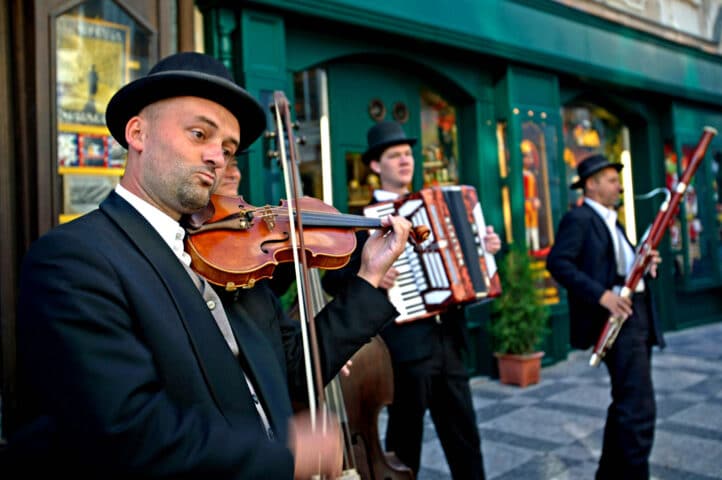 Musicians performing on a street in Czech Republic.