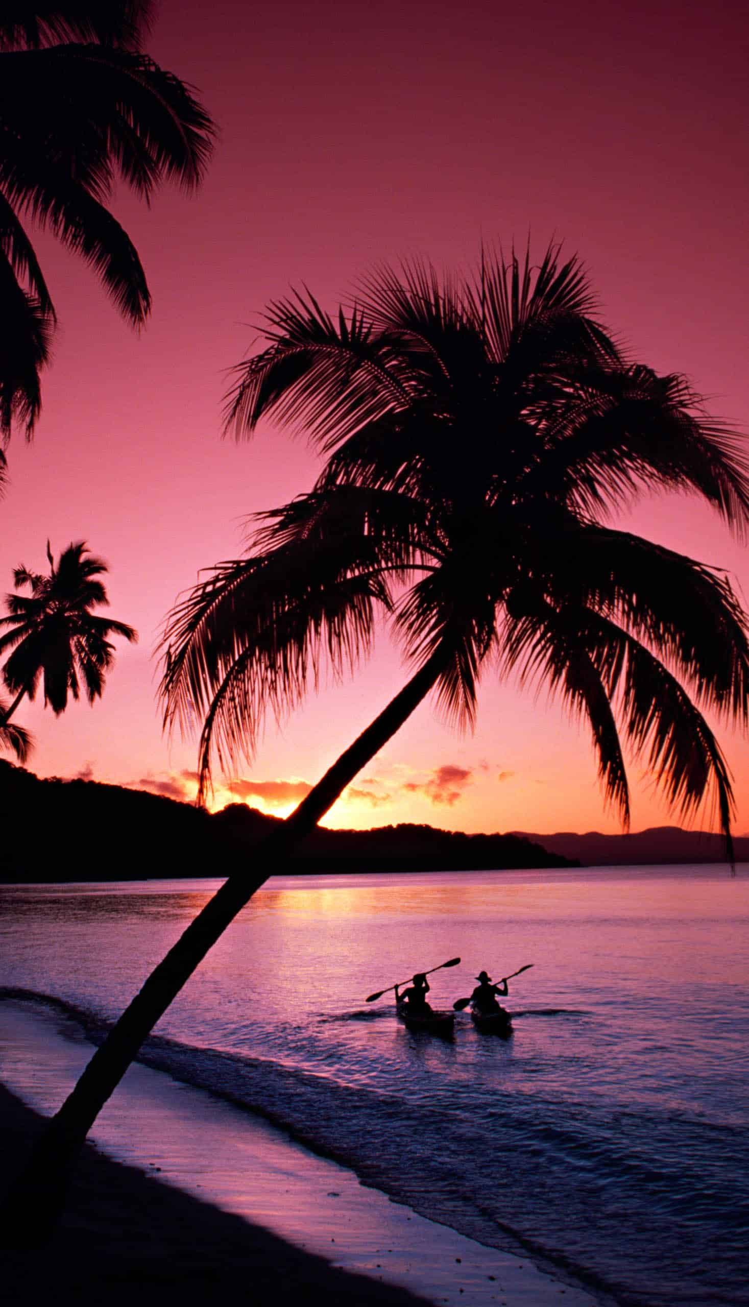 A beach at sunset in Fiji.