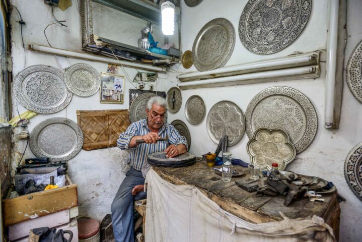 A man and his shop in Iran.