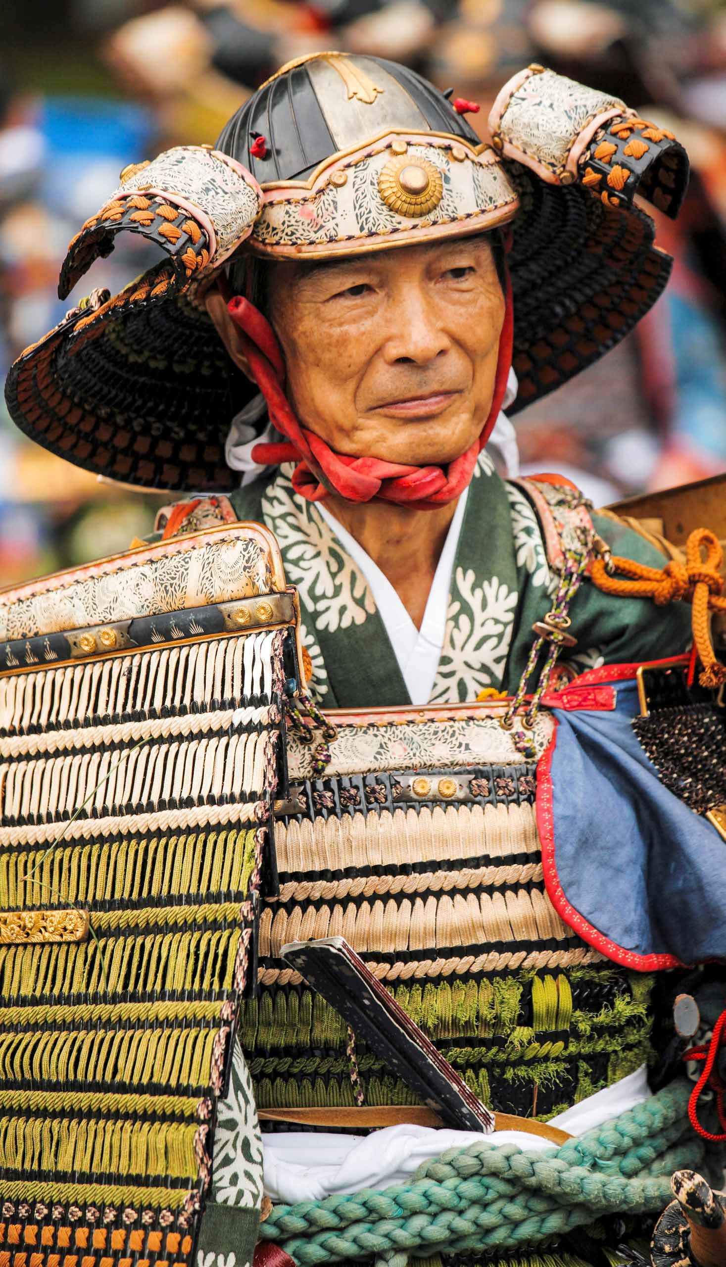 A man dressed in traditional wear for a festival in Japan.