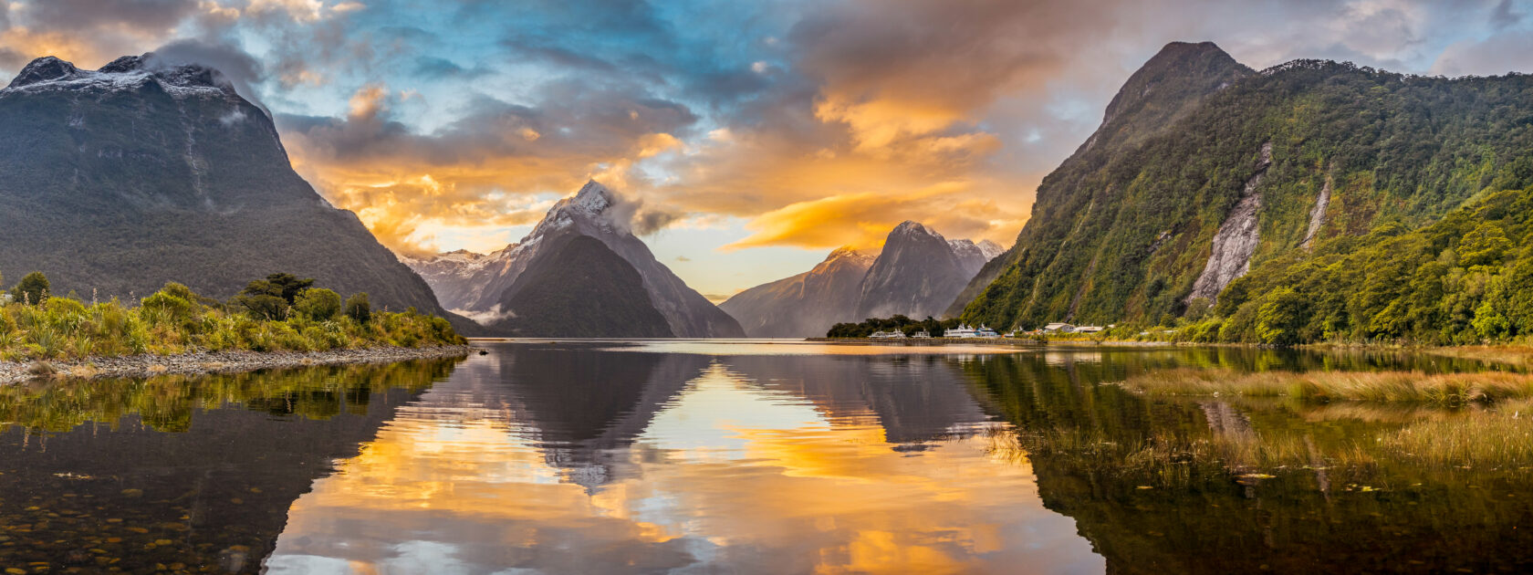 Mitre Peak reflecting in the water, sunset, Milford Sound, Fiordland National Park, Te Anau, Southland Region, Southland, New Zealand