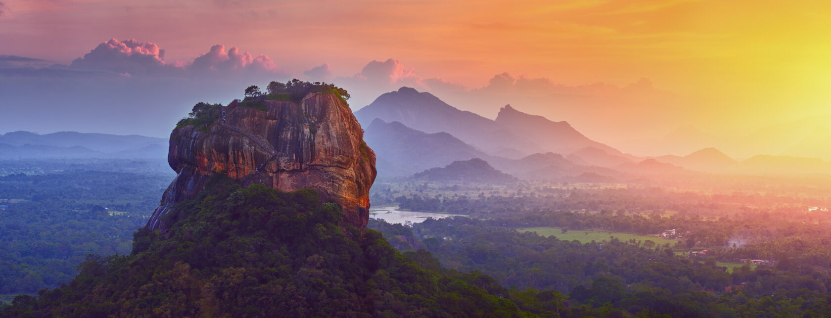 Panoramic view of the famous ancient stone fortress Sigiriya (Lion Rock) on the island of Sri Lanka, which is a UNESCO World Heritage Site.