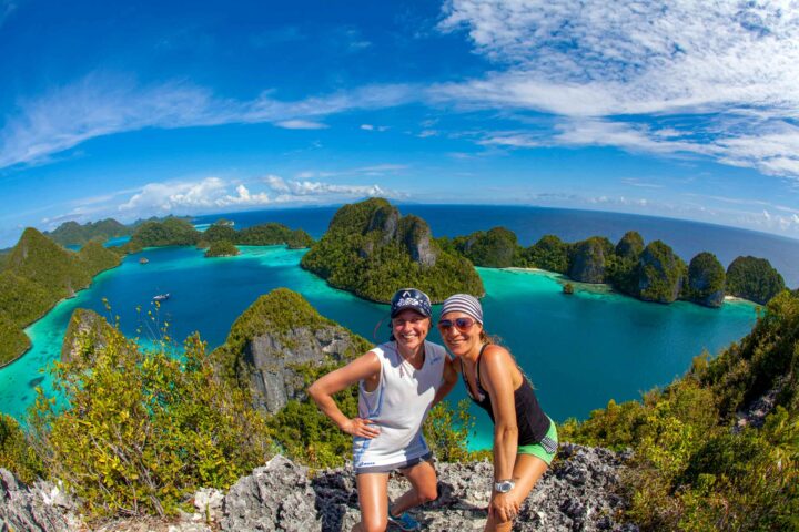 Two tourists in Raja Ampat.