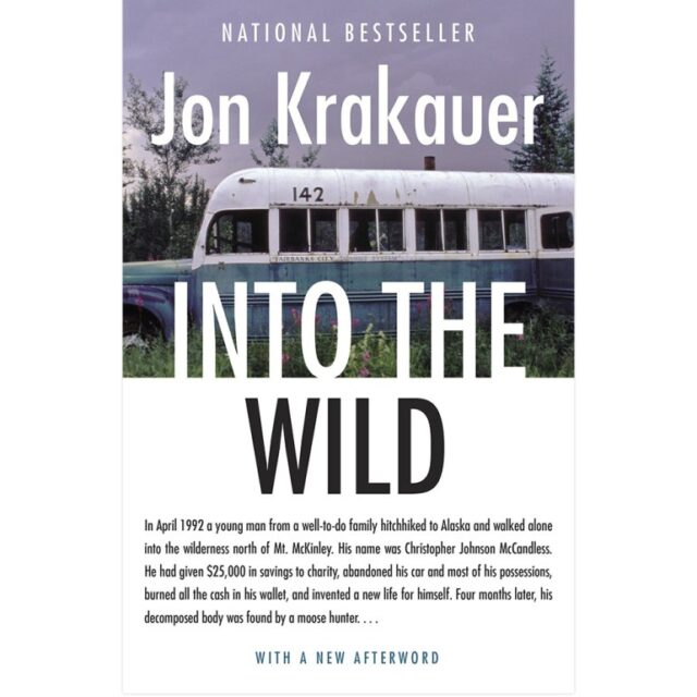 Book cover of "Into the Wild" by Jon Krakauer. The cover features an old bus in a wilderness setting. Text reads that the book is a national bestseller, with a synopsis below detailing the story. Widely regarded as one of the top adventure novels, it's perfect for fans of favorite adventure books.
