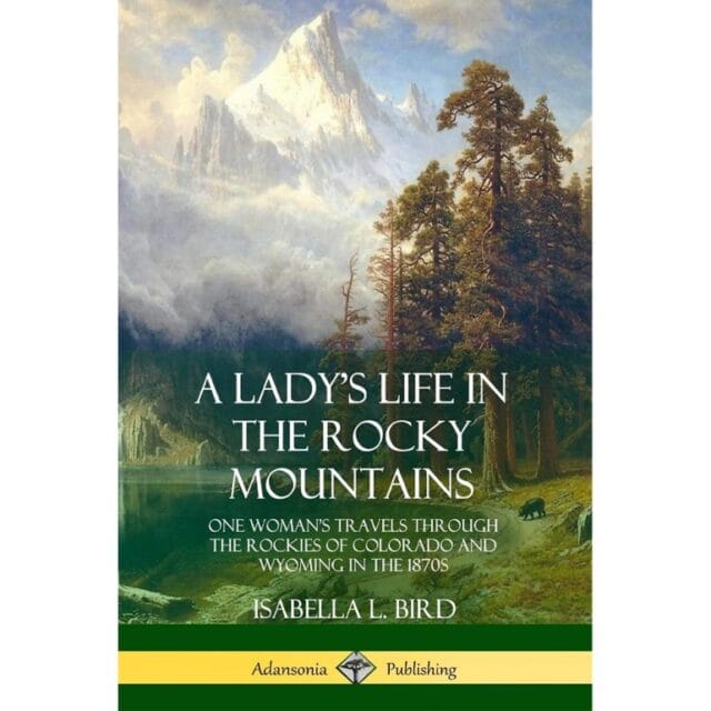 Book cover of "A Lady's Life in the Rocky Mountains" by Isabella L. Bird, it features a painting of mountains and pine trees with a lake. Subtitle: "One woman's travels through the Rockies of Colorado and Wyoming in the 1870s." A must-have for anyone who loves Favorite Adventure Books.