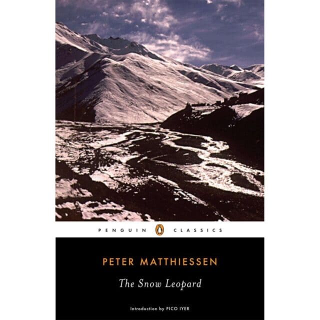 Cover of "The Snow Leopard" by Peter Matthiessen, a favorite adventure book featuring a photograph of a mountainous, snow-covered landscape under a cloudy sky. The text indicates it's a Penguin Classics edition with an introduction by Pico Iyer.